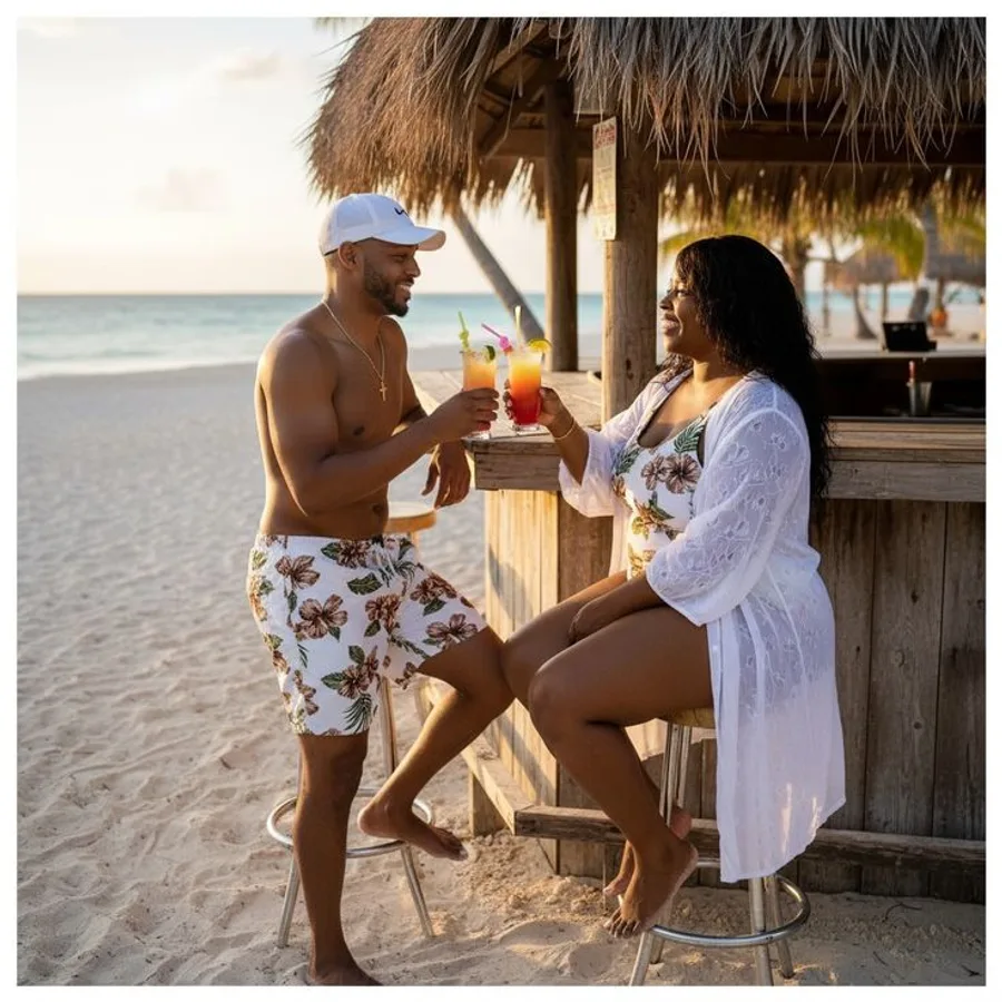 Couple partageant un cocktail en bord de plage